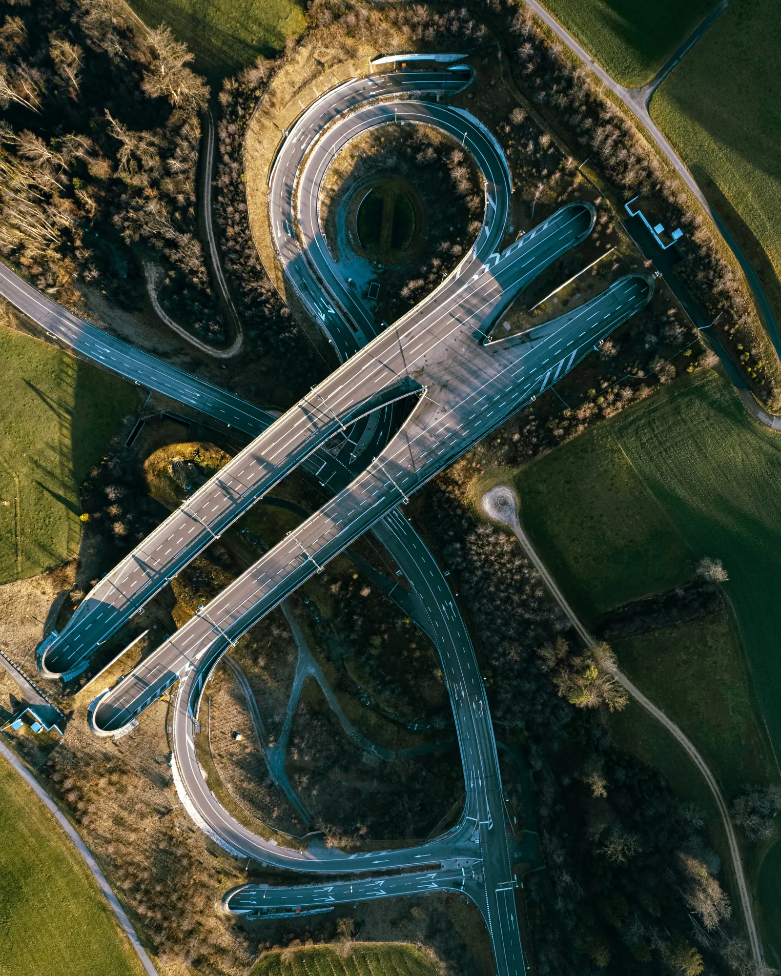 Aerial view of a motorway interchange set in open countryside