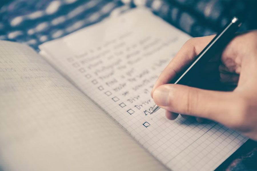 Handwriting a checklist for putting a strategy into action
