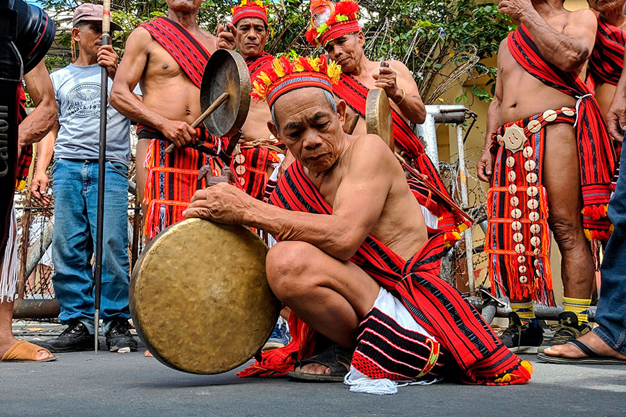 Indigenous community members gathered, representing the role of Indigenous peoples in biodiversity conservation